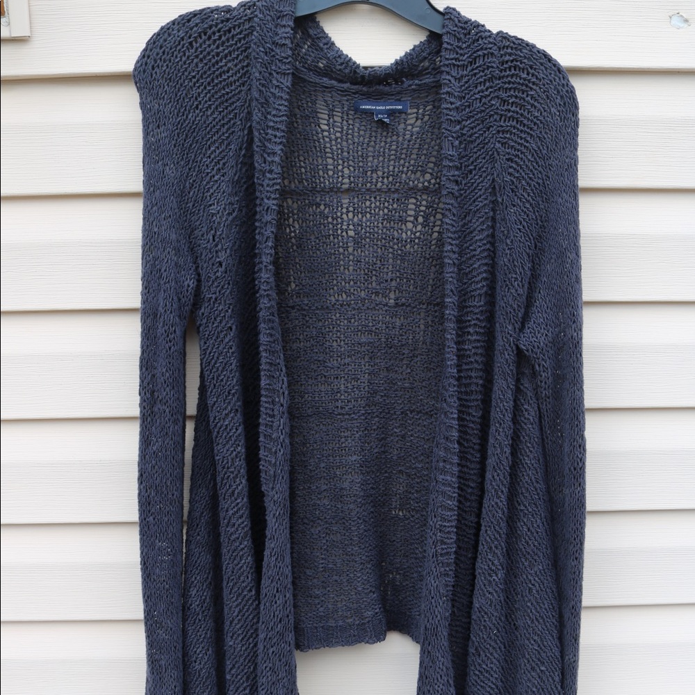 a gray knit cardigan